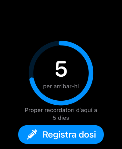 Dial a l’Apple Watch amb un anell de cicle que compta els dies fins a la propera dosi, el proper recordatori i un botó per registrar