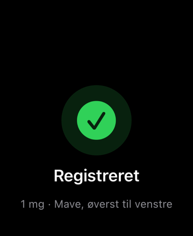 Dial på Apple Watch bekræfter en registreret dosis med et flueben og viser mængde og injektionssted