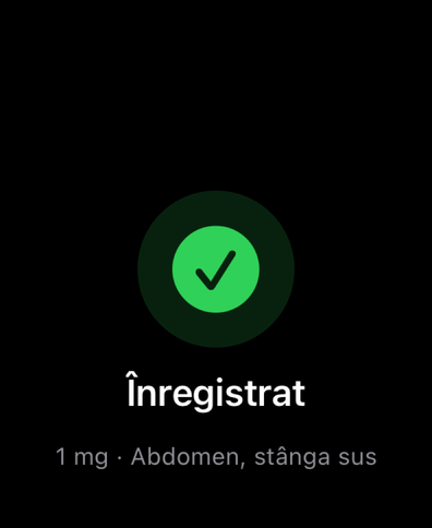 Dial pe Apple Watch confirmă o doză înregistrată cu o bifă și arată cantitatea și locul de injecție